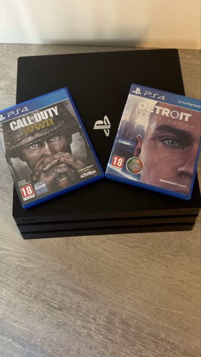 Sony playstation 4 pro e conjunto de 4 jogos