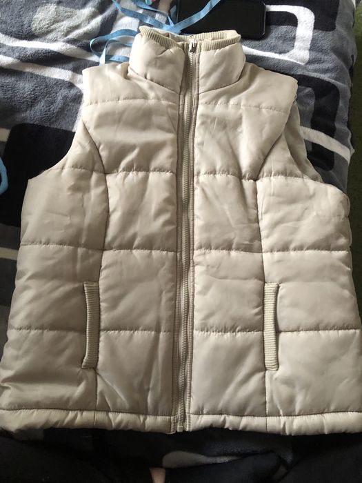 Жіноча безрукавка