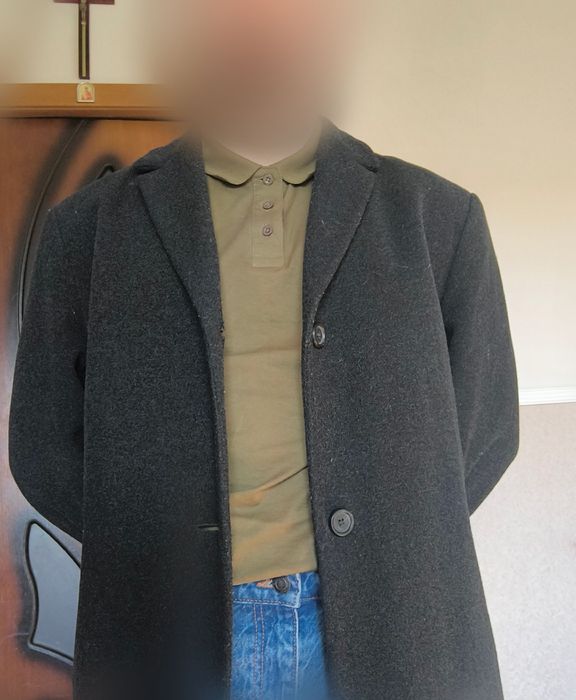 Пальто чорного кольору