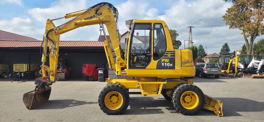 Komatsu <<Koparka Komatsu PW110, 4 koła skrętne,hydrauliczne szybkozłączę, sprowadzona>>>>  <<Koparka Komatsu PW110,4 koła skrętne,ramię 3x łamane,sprowadzona!>>