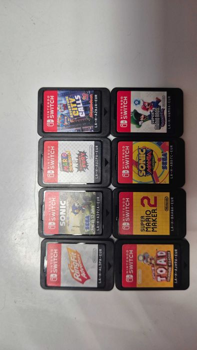 Nintendo Switch V2 + 8 gier