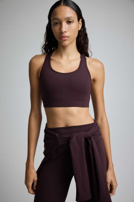 Спортивний топ H&M SoftMove™ в сірому кольорі