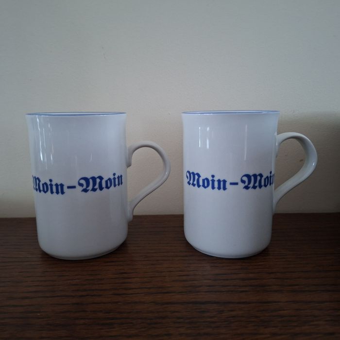 2 kubki z przywitaniem