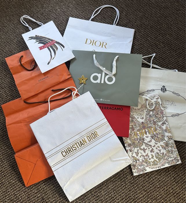 Пакети prada Feraggamo dior hermes Clarins Alo Kith kenzo cartier