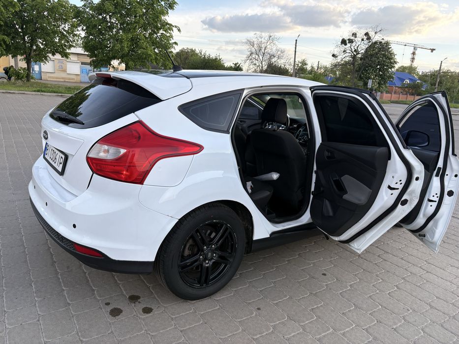 Ford Focus 2012 VIN WF0KXXGCBKCC21674 фото оголошення 5 з 8