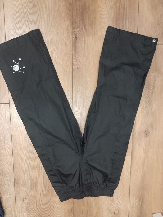 Spodnie przeciwdeszczowe 122/128