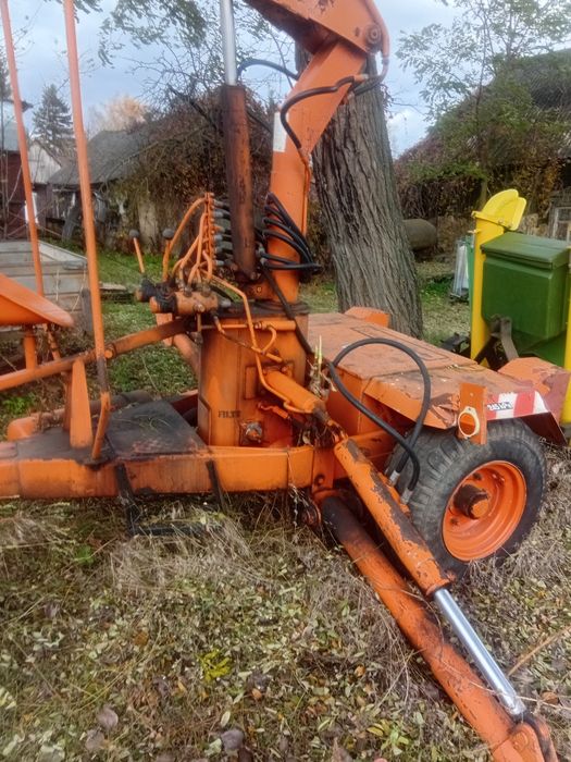 Грейферний навантажувач,причіпний