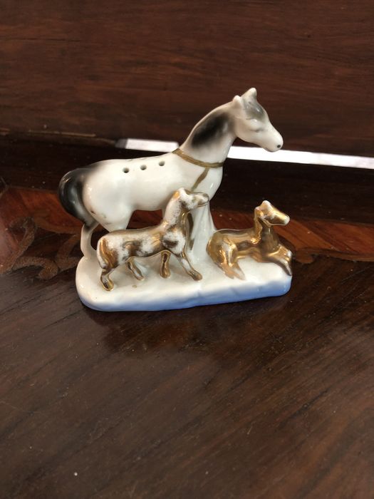 Paliteiros em porcelana e biscuit