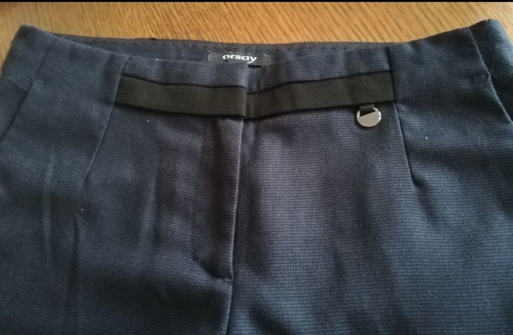 Materiałowe spodnie Orsay, r. 34