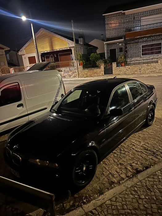 BMW E46 preto sedan