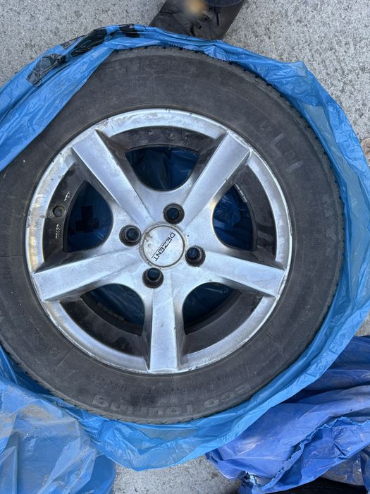Alufelgi R14 4x100 + opony 165/70 R14 komplet 4 szt.