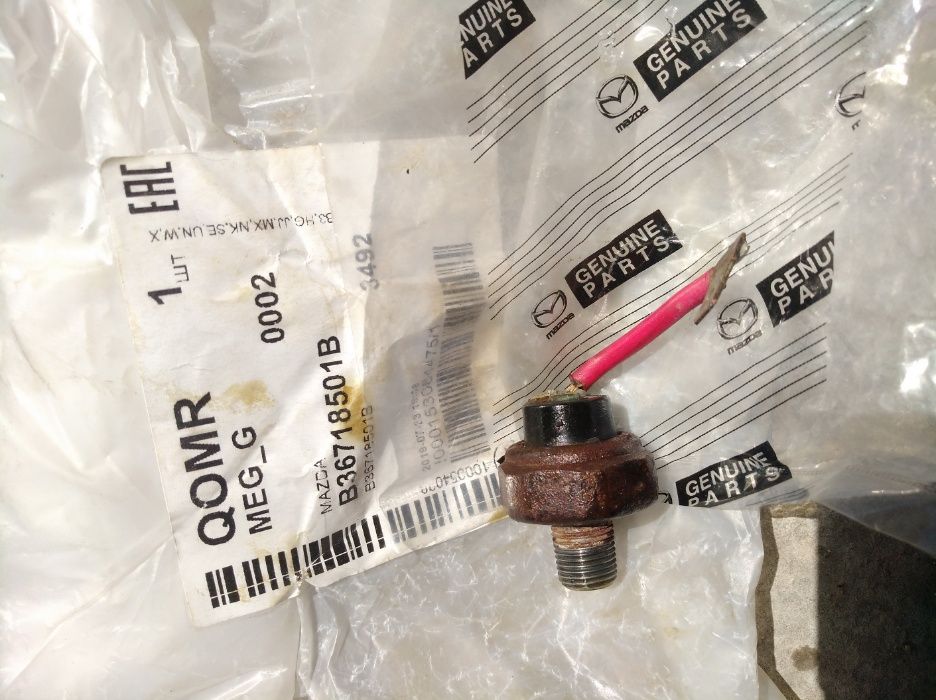 Датчик температуры масла Мазда 3