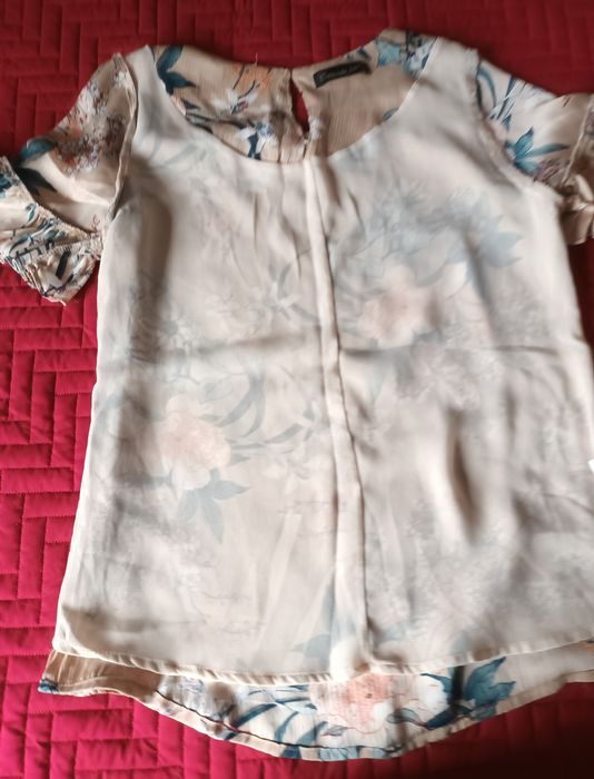 Blusa primaveril em tons suaves