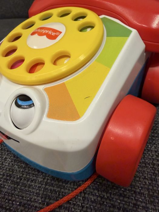 Іграшка каталка Веселий телефон Fisher Price оригінал