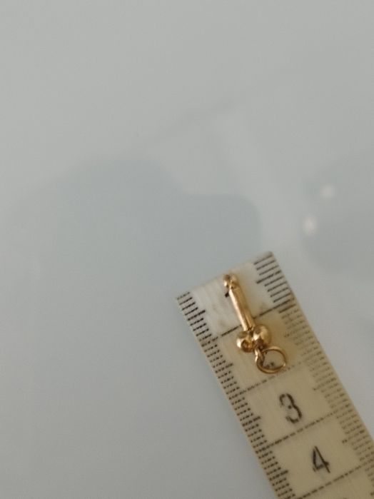 Medalha falo em ouro de 19,2kt