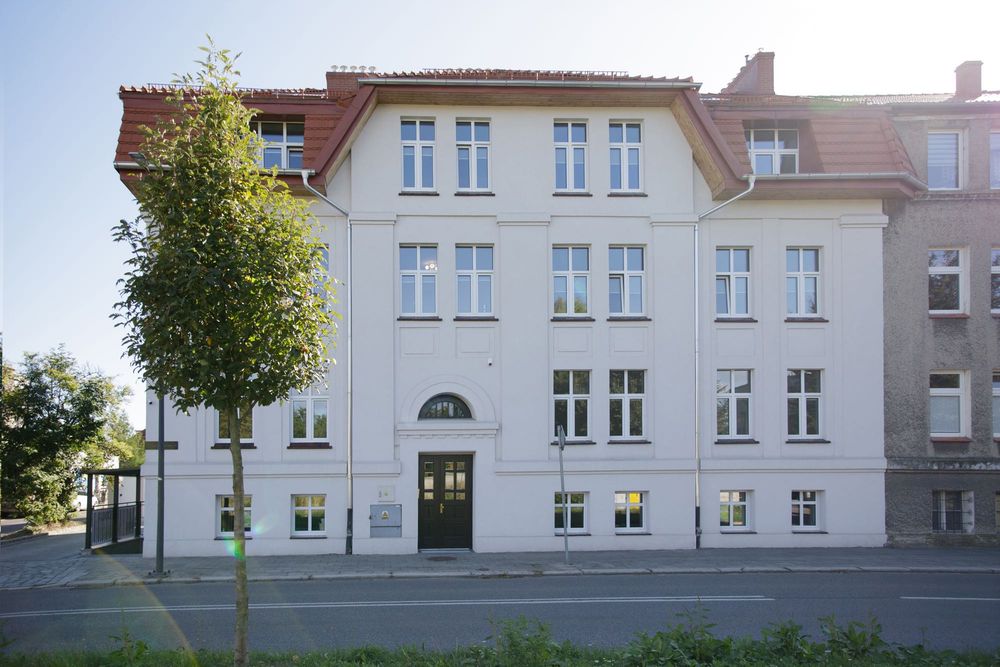 Przestrzeń i elegancja w zabytkowej kamienicy – ul. Michejdy | 68,9 m² | salon z otwartą kuchnią | 2 sypialnie | prywatny parking