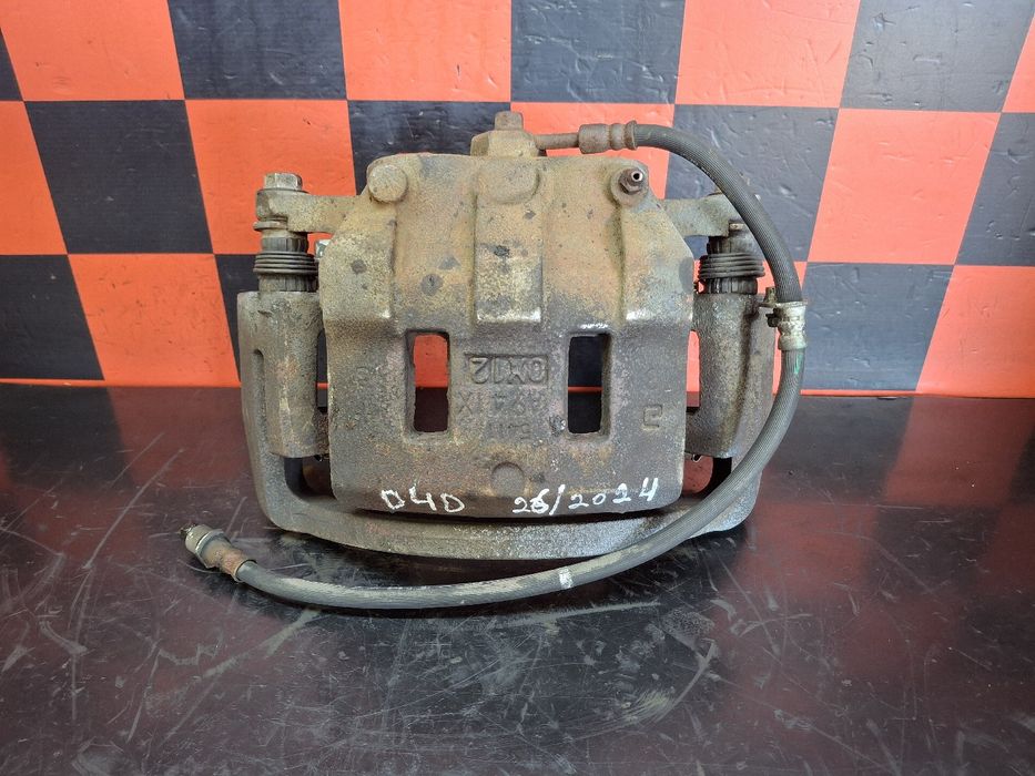 Pinça travão / maxila de travão frente esquerda TOYOTA Dyna Chassis (K