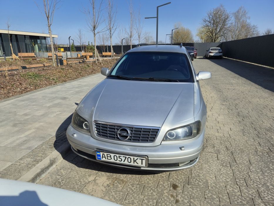 Opel Omega B.    —    2,5TD   M57.    
Про