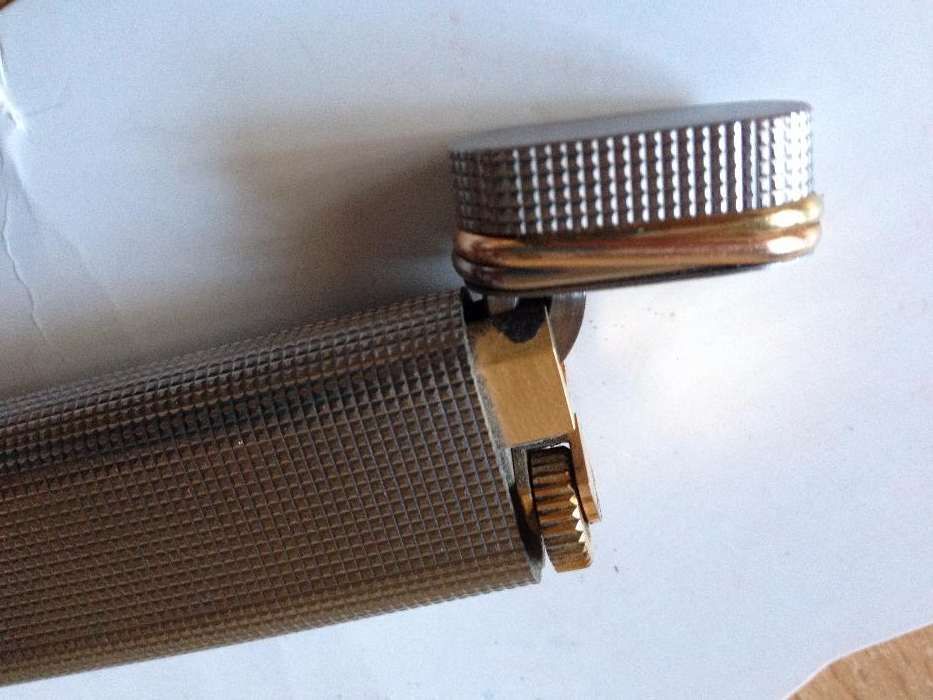 Isqueiro de Must de Cartier, anos 80, autentico, tem pouco uso