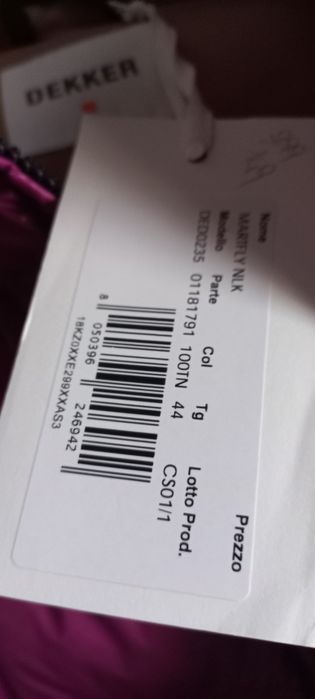 Продам женский пуховик 100%пух.фирма DEKKER из Италии