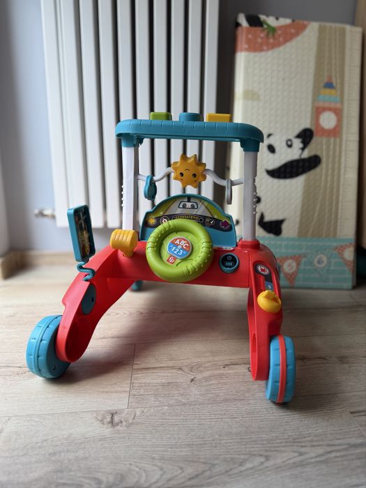 Grający pchacz Fisher Price