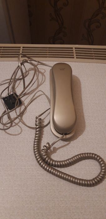Телефон кнопочный  проводной б/у,рабочий.
