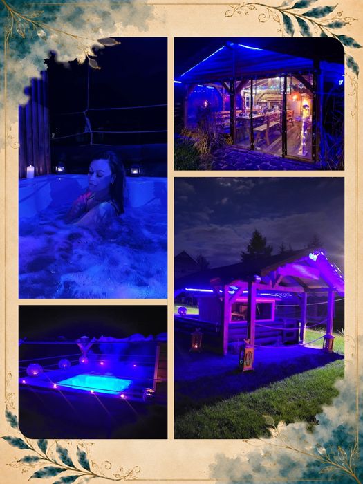 Domek nad jeziorem z jacuzzi, sauną i strefą masażu .