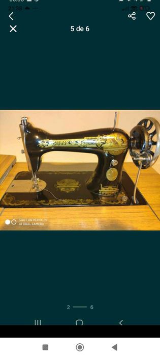 Máquina de costura singer