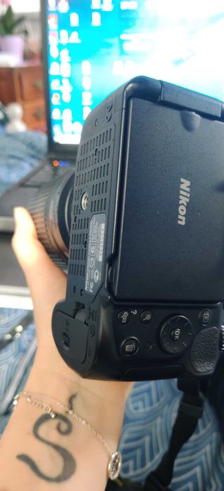 Nikon 5200, Lente, 2 baterias e uma mochila e mais coisas