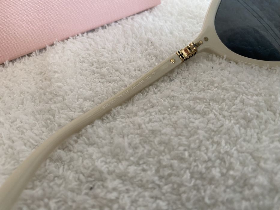 Okulary Miu Miu SMU A01