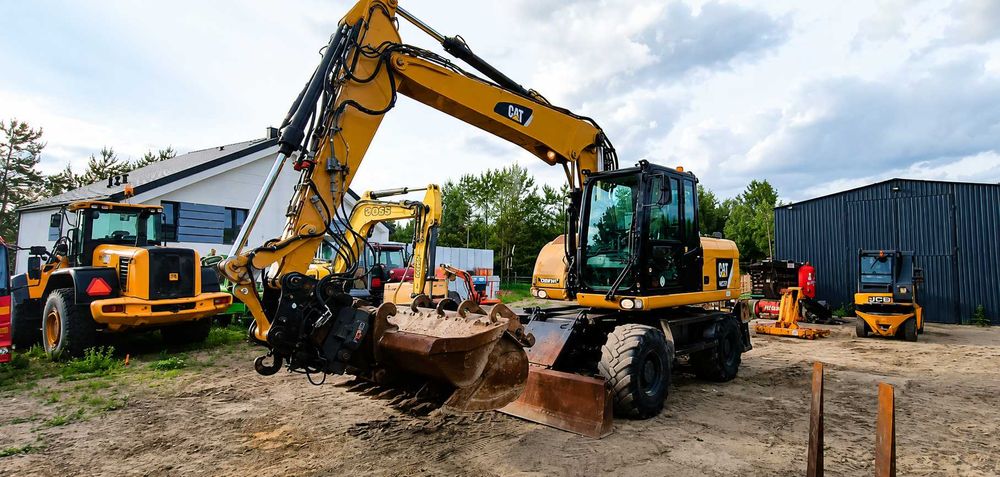 CAT M313D 2014r 9900mtg Sprowadzona + 3 łyżki Rototilt Volvo EW140