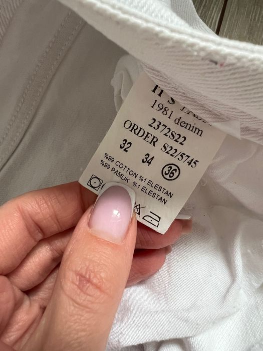 Білі джинсові штани