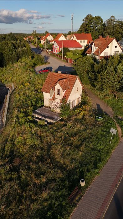 Działka z budynkiem handl.-uslug. przy DK63 Mazury