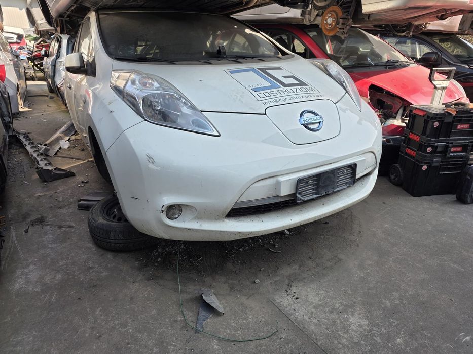 NISSAN LEAF I 16R 326G ZDERZAK MASKA BLOTNIK LAMPA CHLODNICE PAS PRZOD