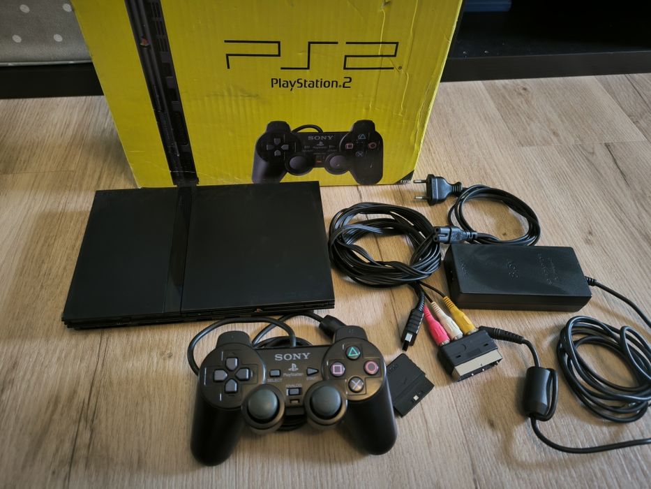 PlayStation 2 Slim in very good condition (Setúbal)64752024350083120