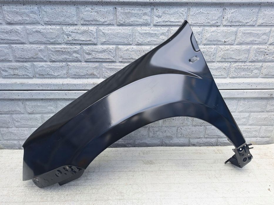 dacia duster i 1 błotnik lewy przedni nowy oryginał