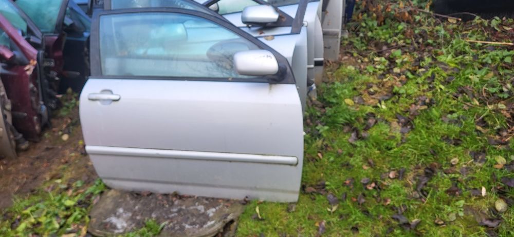 Maska Toyota Corolla E 12  Srebrna