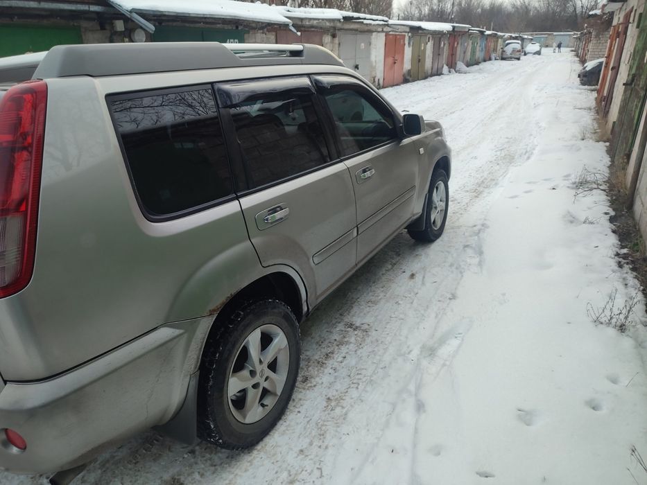 Nissan.   X Trail