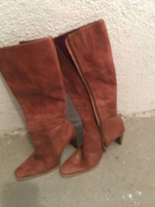 Botas em Pele de cano alto