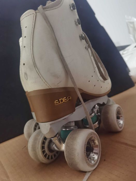 Patins de patinagem artística