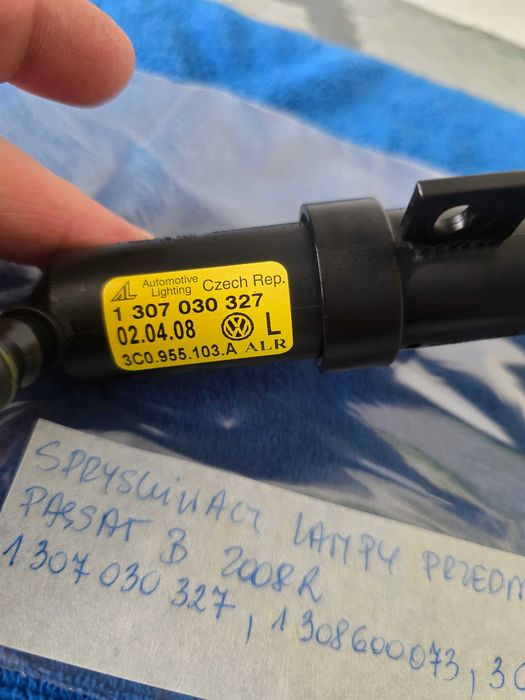 Spryskiwacz lampy przedniej lewej VW PASSAT B6 2008