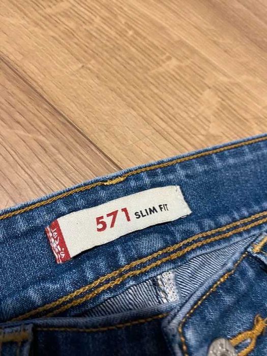 Spodnie damskie jeansowe Levis 571 slim fit niebieski denim 29x30 styl