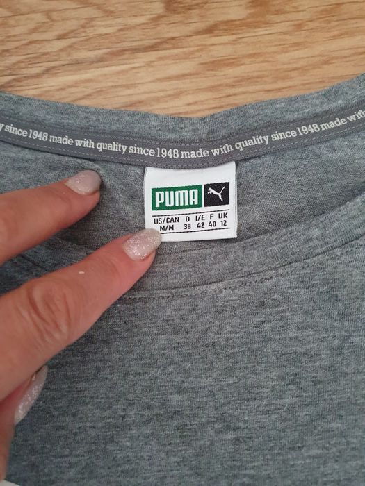 Сіра жіноча футболка Puma
Puma