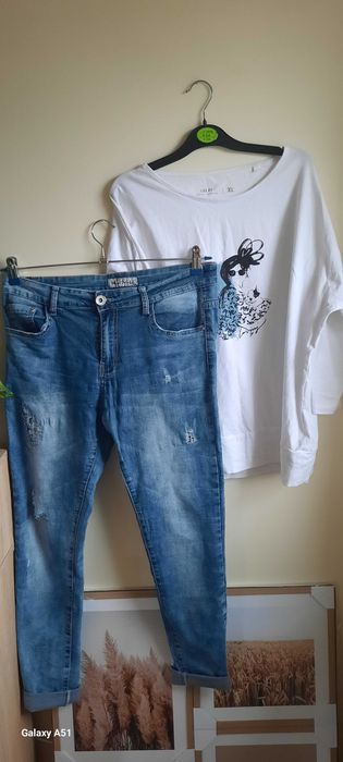 Jeansy z przetarciami haftowane kwiatki