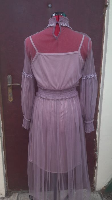 Гарна фіолетова сукня
