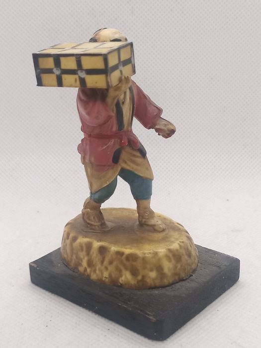 Figura antiga de camponês chinês