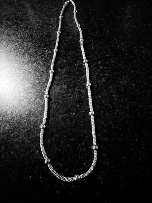 Fio de prata para senhora.