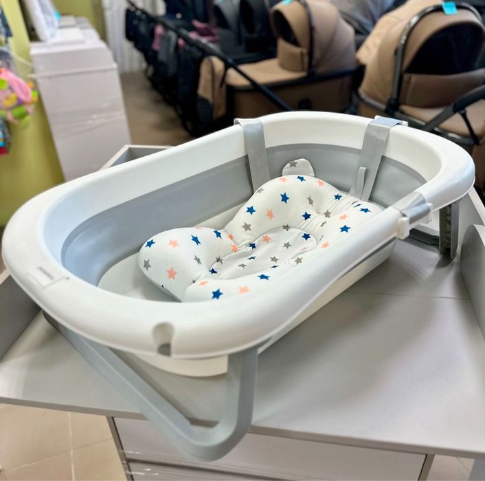 В продажі є окремо подушка на складну ванночку і звичайну