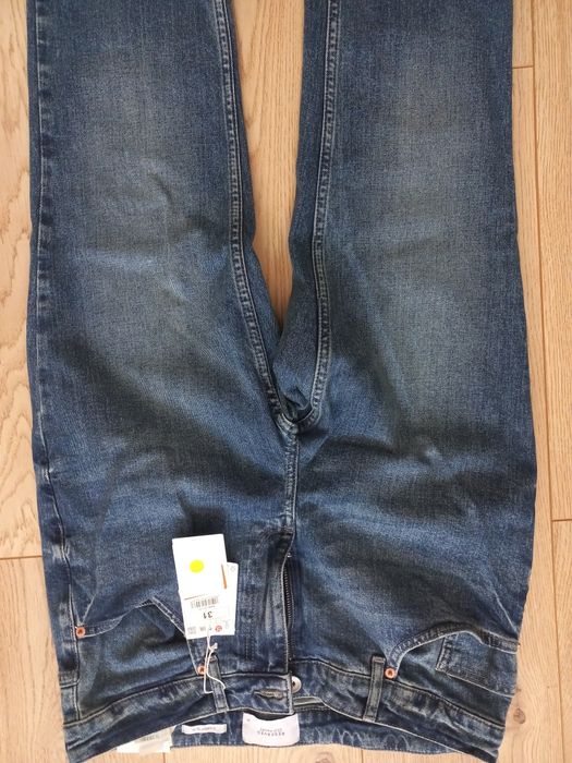 Nowe spodnie Reserved Carrot Slim 31