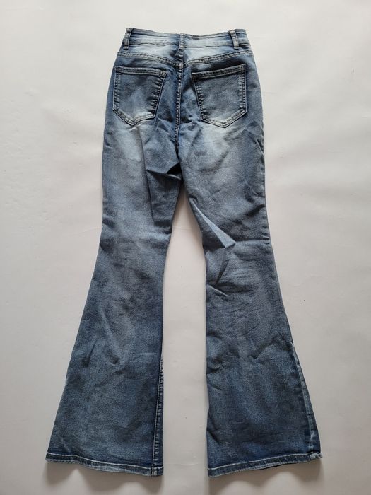 Jasne jeansowe spodnie dzwony bootcut flare wysoki stan przetarcia XS